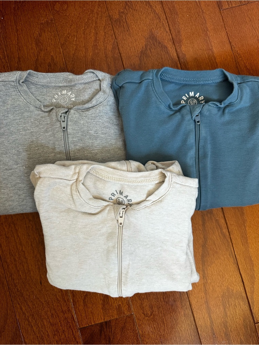 Primark Trio of Zip-Up Footies in Gray, Blue, Cream